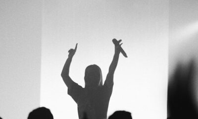 man holding microphone at the stage