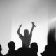 man holding microphone at the stage